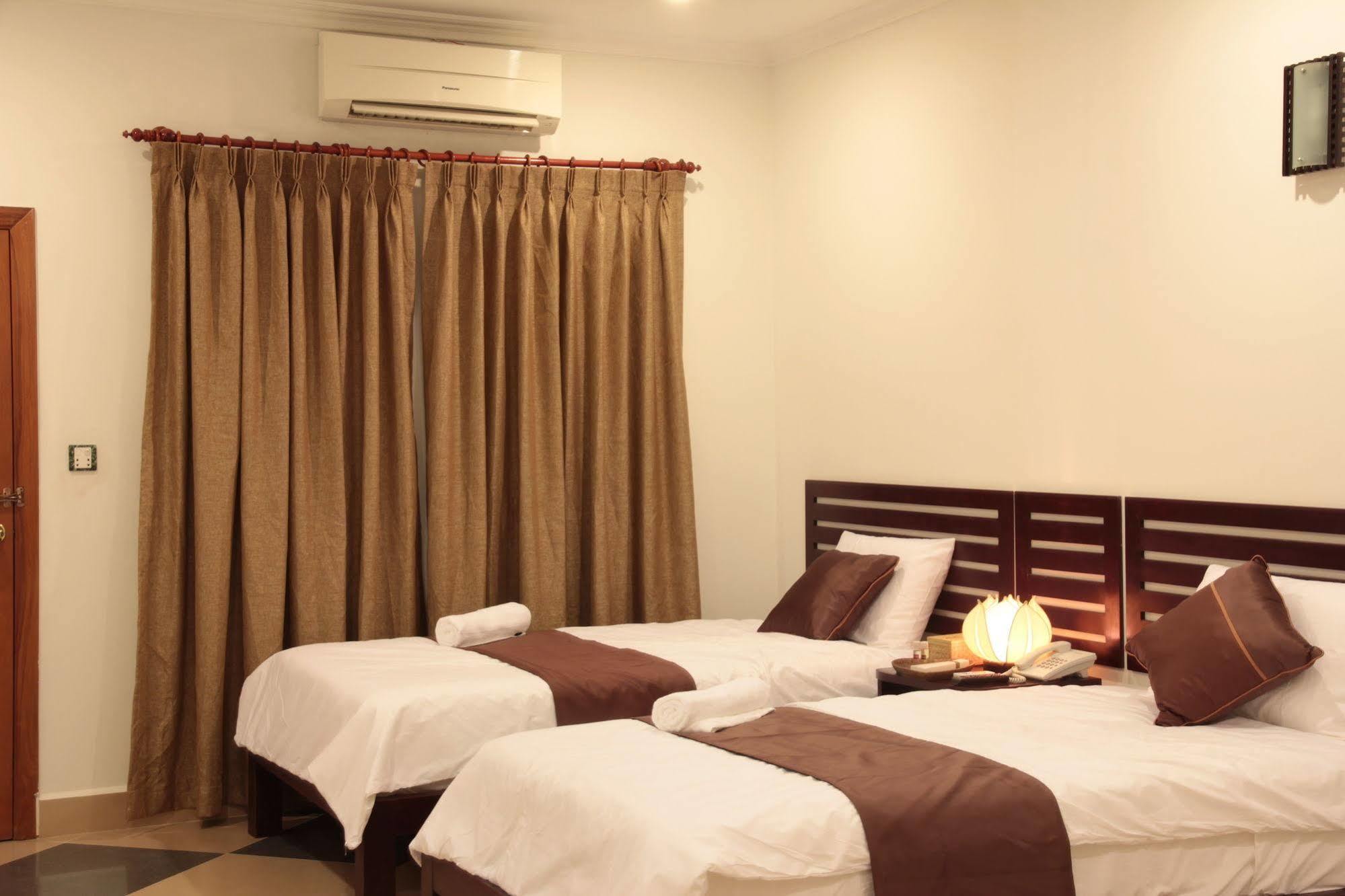 Aime House & Niisaii Apartment Phnom Penh Bagian luar foto